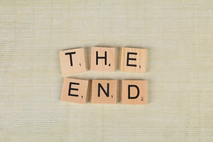close up of scrabble tiles forming the words the end